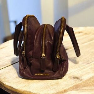 Claudia Ciuti Burgundy Leather Interior